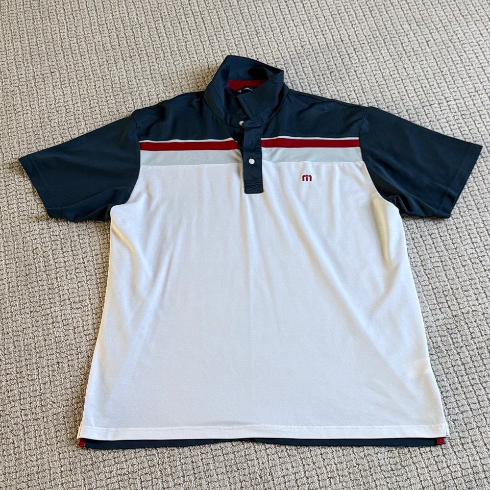 Travis Mathew Navy and White Polo with Red Accents